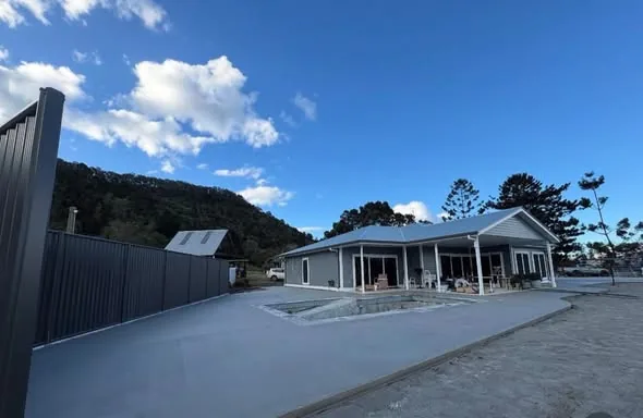 Concrete surround around a home and pool area