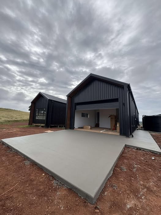 Fresh concrete apron poured for a new shed